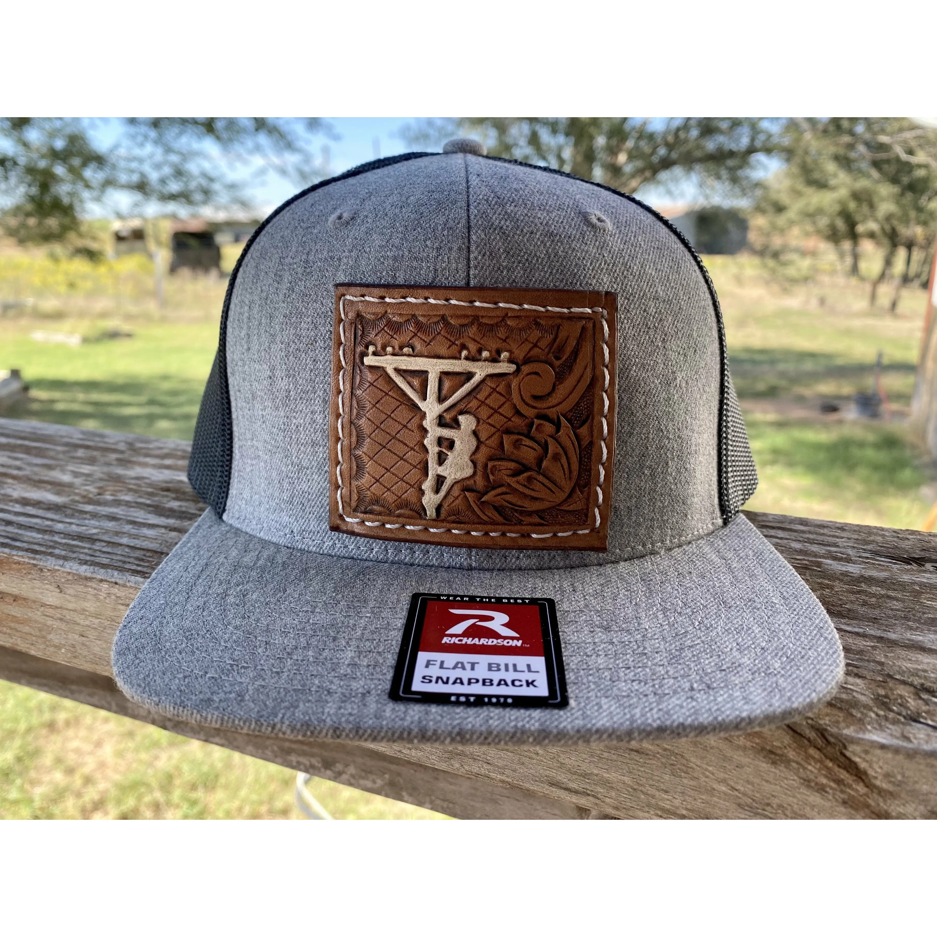 Custom patch on Flatbill Snapback hat