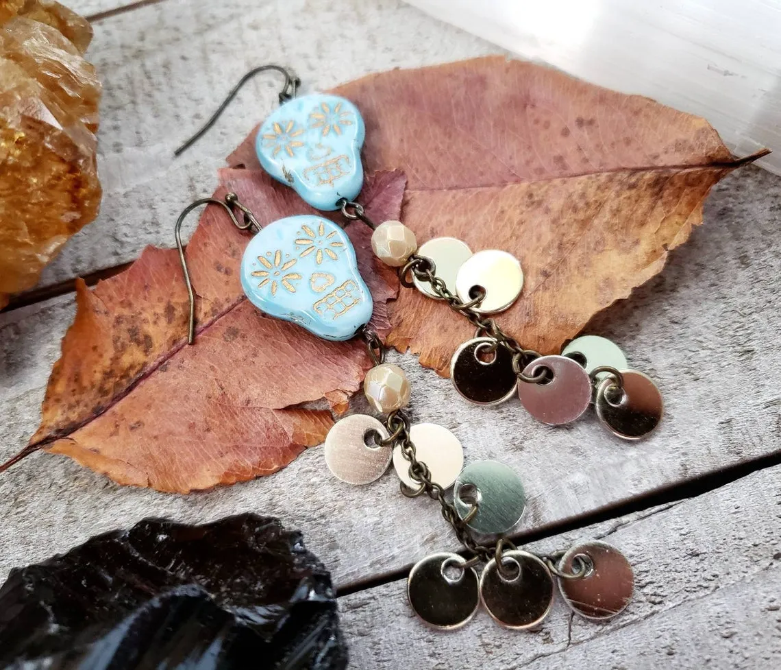 Skull coin duster earrings