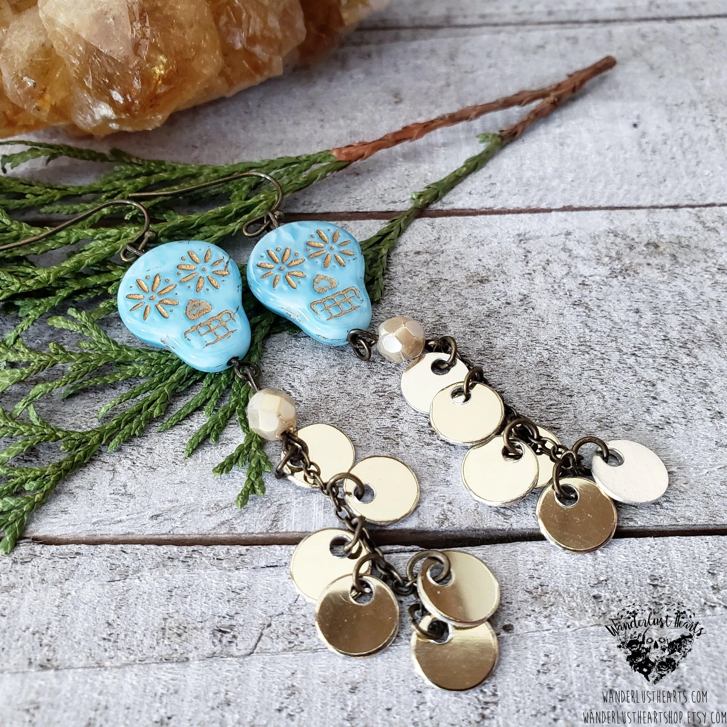 Skull coin duster earrings