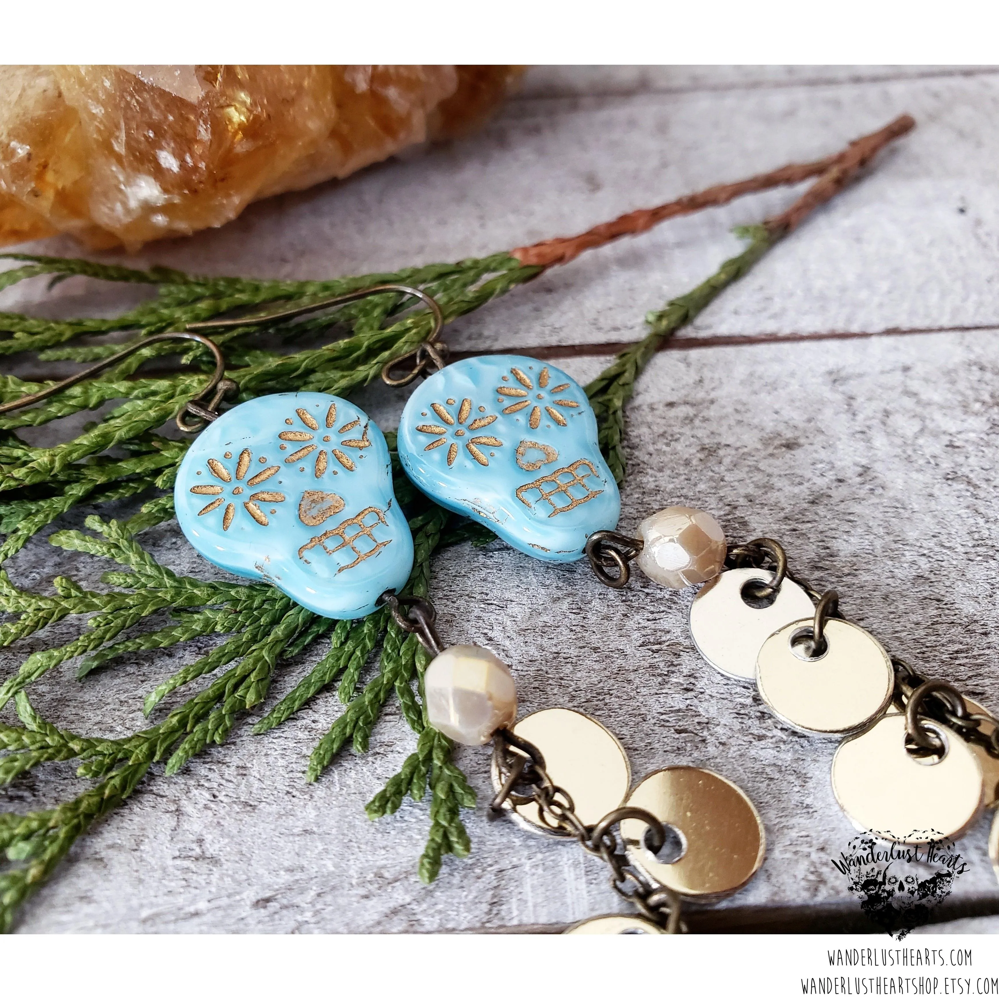 Skull coin duster earrings