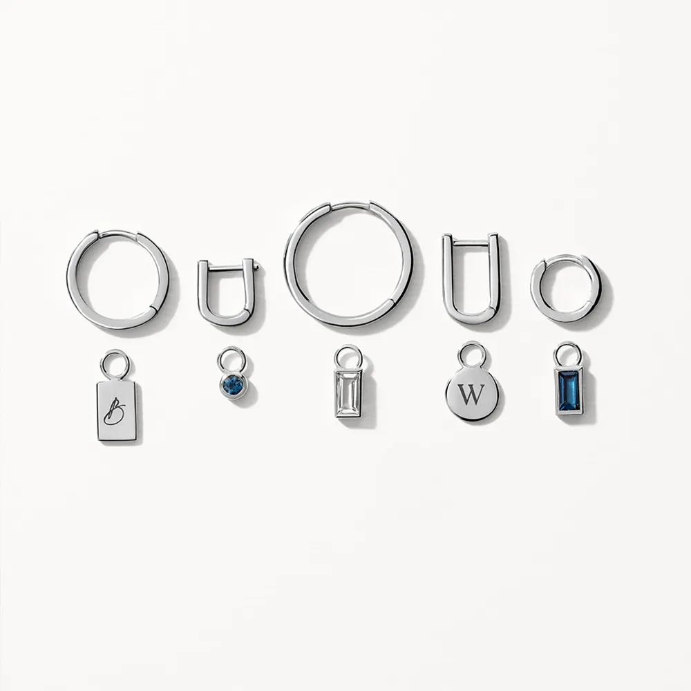 White Topaz Circle Charm in Silver
